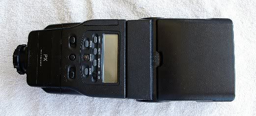 IMAGE: http://i41.photobucket.com/albums/e270/Z740gal/A-50Promaster7000MFlashB081706K100D.jpg