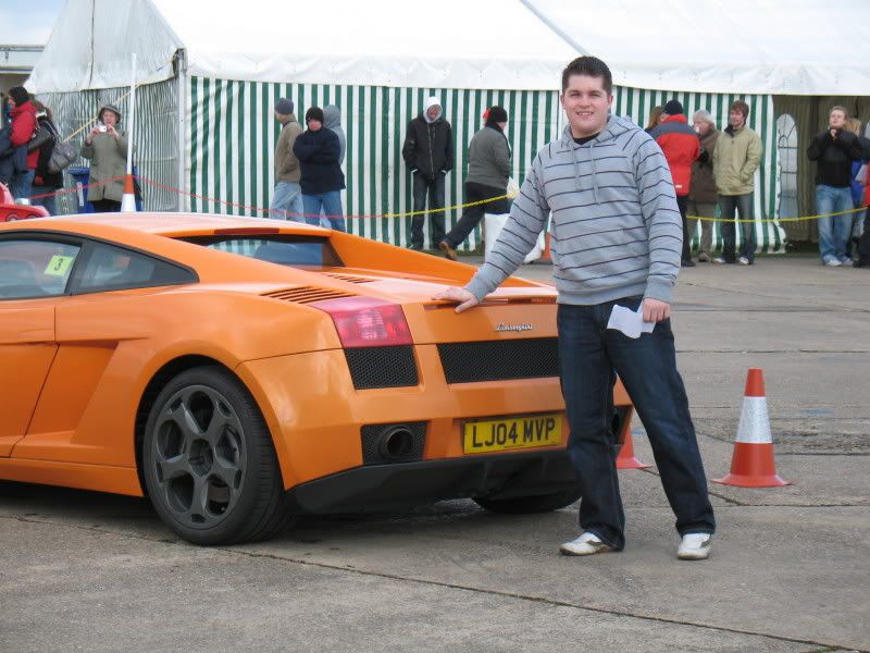 Andy after his drive in a  Lambo