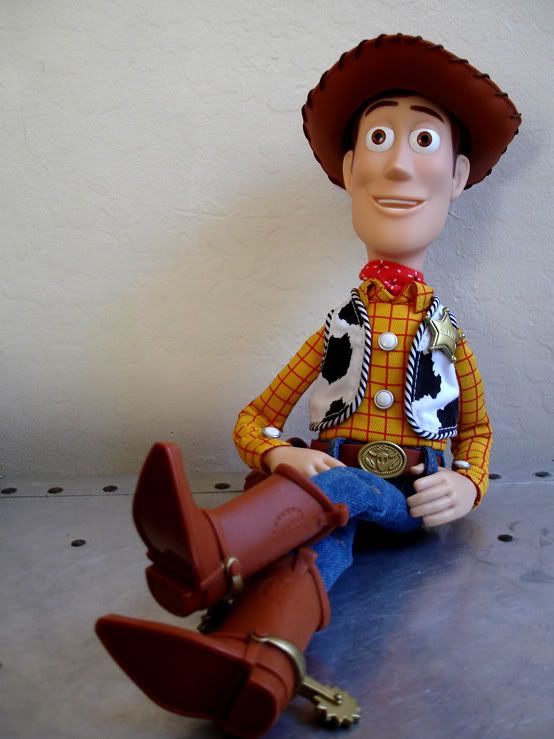 woody toy story sitting